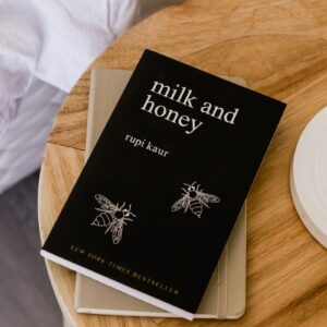 Milk and Honey by Rupi Kaur book on side table