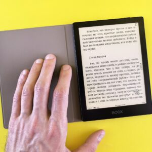 A person is reading a book on a tablet